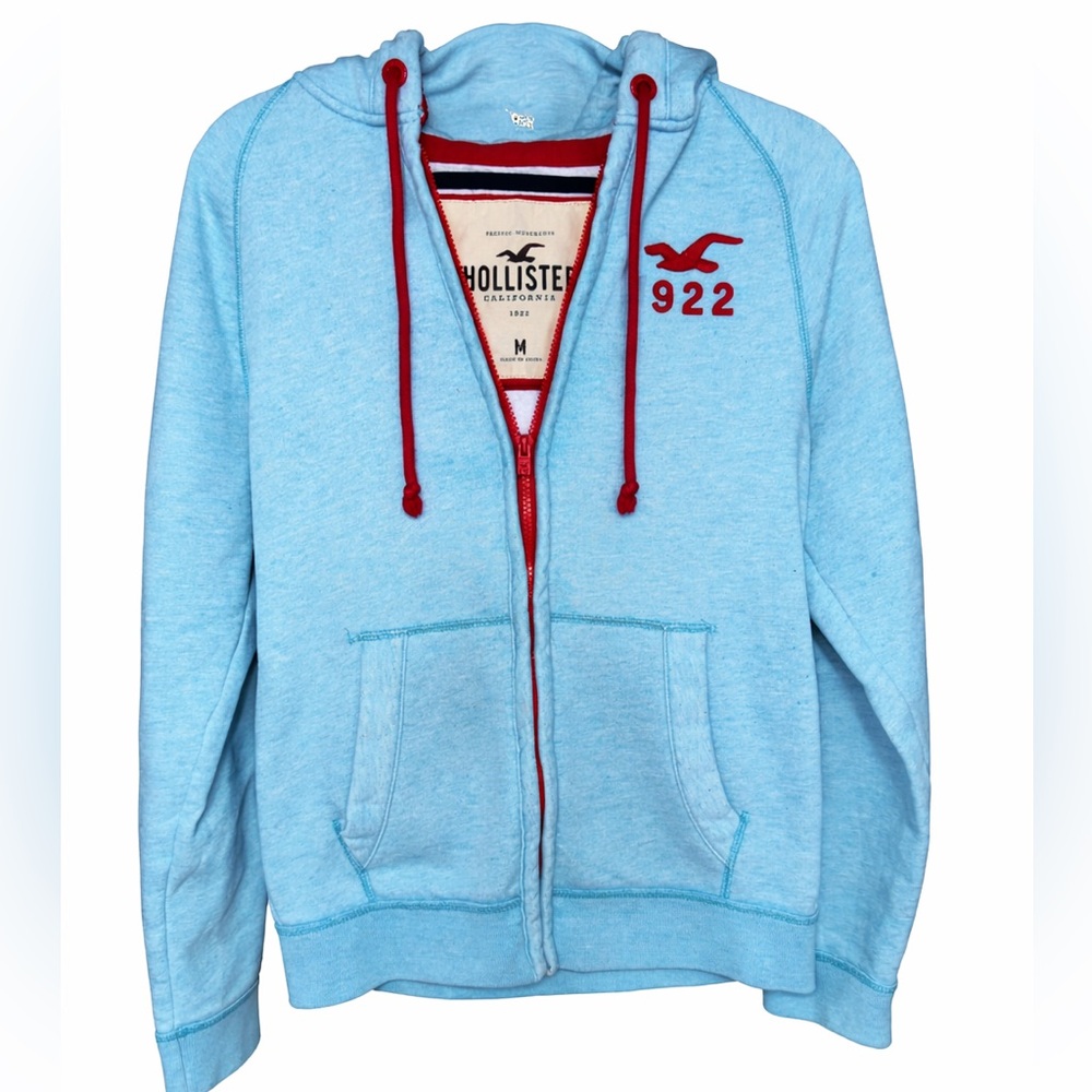Hollister Men’s Light Blue Zip Hoodie with Red Accents